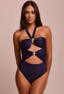 Body feminino azul marinho com medalhas náuticas douradas e recortes frontais, modelo usando.