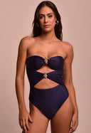 Body feminino azul marinho com recortes frontais e medalhas douradas, modelo frontal.