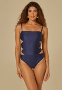 Body Thays Marinho azul marinho com recortes laterais e alças finas, modelo feminina de frente, fundo bege.